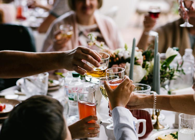 Wedding table with drinks cheering